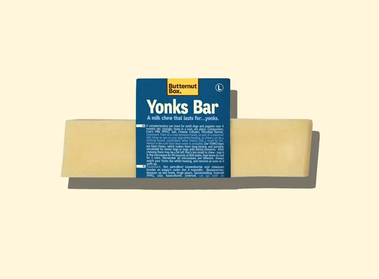 Butternut Box Yonks Bar pet treat, a long-lasting milk chew for dogs, in blue packaging against a light background.